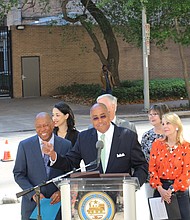 Nothing but smiles as Harris County Commissioner Rodney Ellis, with Houston Mayor Sylvester Turner on the left, announces Precinct One’s $10 million, one-year commitment for pedestrian- and bike-safety improvements on Houston streets.
