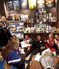 Ministers and rabbis stage a sit-in at the Center City Starbucks in Philadelphia to protest the arrest of two African-American men who were waiting at the coffee shop for a friend to arrive. The protest reflects the backlash against the company over the incident. The manager who called police to remove the alleged trespassers no longer works at the cafe.