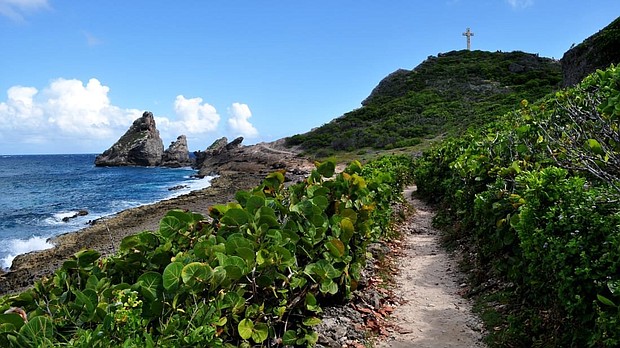 Located within the lower crescent of the Caribbean archipelago between the islands of Montserrat and Dominica, the French Caribbean islands of Guadeloupe offer travelers a chance to explore the beauty and culture of this lesser known island.