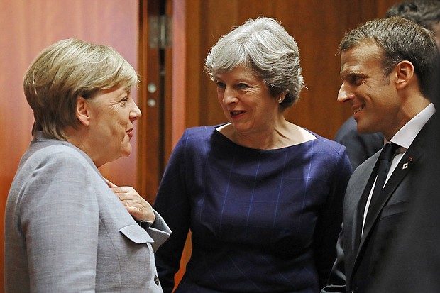 From left, German Chancellor Angela Merkel, British Prime Minister Theresa May and French President Emmanuel Macron. The three nations are calling on Trump to honor the Iran deal.  CREDIT: Dan Kitwood/Getty Images Europe/Getty Images