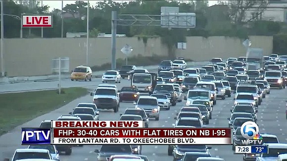 The Florida Highway Patrol said 30 vehicles experienced flat tires Monday morning on Interstate 95 northbound in Palm Beach County …