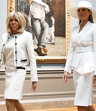 When President Donald Trump and first lady Melania Trump arrived on the White House South Lawn Tuesday morning to formally welcome French President Emmanuel Macron and his wife, Brigitte, one thing was clear: The first lady commanded attention./Getty Image