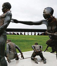 Statues depict chained people at the National Memorial for Peace and Justice in Montgomery, Ala., the new memorial scheduled to open April 26 to honor thousands of people killed in lynchings in the United States.