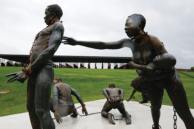 Statues depict chained people at the National Memorial for Peace and Justice in Montgomery, Ala., the new memorial scheduled to open April 26 to honor thousands of people killed in lynchings in the United States.