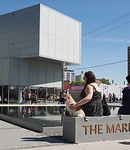 ICA grand opening // Virginia Commonwealth University students and community members join in the grand opening Saturday of the new Institute for Contemporary Art at Belvidere and Broad streets. The new 40,000-square-foot center includes a reflecting pool  where visitors lounged and enjoyed music during the opening community block party.
