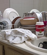 A Las Vegas woman desperate for running water is cleaning dishes in her bathtub./Source:	KTNV