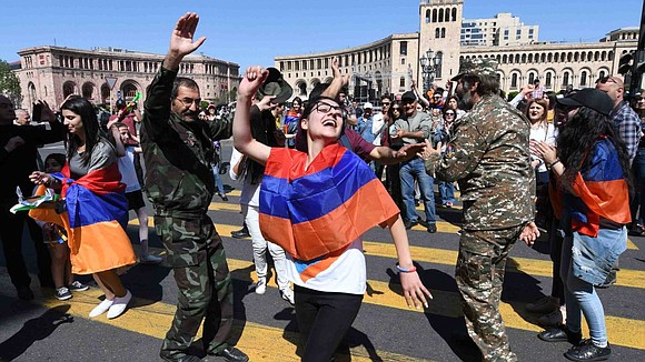 Armenia's capital Yerevan was brought to a standstill on Wednesday as thousands of demonstrators blocked roads and danced in the …