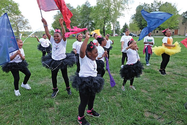Loving the dance! // Youngsters from the World Fitness Dance Academy, above left, show their enthusiasm during the academy’s National Dance Celebration last Saturday.
