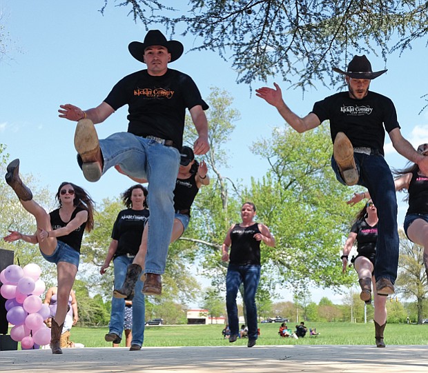 The free event, held on the grounds at St. Joseph’s Villa in North Side, featured all forms of music and dance. Above right, high steppers from Kickin’ Country show off their moves