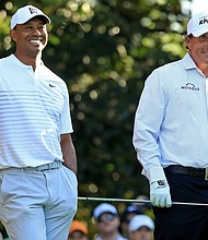 Tiger Woods (left) and Phil Mickelson played a surprise practice round together ahead of the Masters.