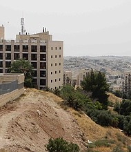 This building tucked into a hill about a mile south of the white limestone of the Old City is the soon-to-be US embassy in Jerusalem.