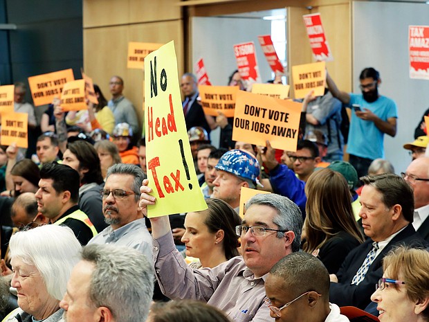 Starbucks was scathing Tuesday in its criticism of the Seattle City Council, which on Monday unanimously passed a controversial tax on big businesses to help fund affordable housing and fight homelessness.