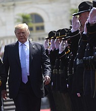 President Donald Trump arrives to address the 37th Annual National Peace Officers Memorial Service at the US Capitol in Washington.