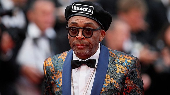 Director Spike Lee received a six-minute standing ovation at the Cannes Film Festival after the Monday night premiere of his …