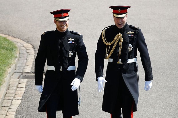 	Prince Harry, pictured left, arrives with his best man Prince William at St George's Chapel, in Windsor, on Saturday.