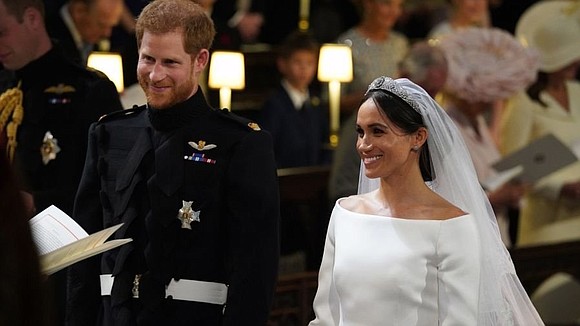 And they're married! Britain's Prince Harry and US actress Meghan Markle sealed their wedding vows with a kiss on the …