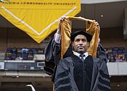 Actor Boris Kodjoe, a Virginia Commonwealth University alumnus and athletics hall of famer, receives an honorary degree after delivering the commencement speech during Saturday’s ceremony.