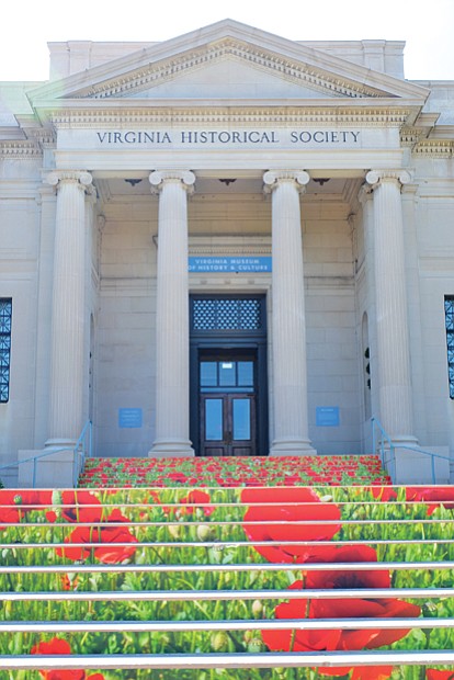 A pop of color // A field of colorful printed poppies decorates the front steps of the Virginia Museum of History and Culture. Location: 428 N. Boulevard. The red flowers, known as remembrance poppies, are designed to call attention to the World War I America exhibition on display at the museum through July 29. Poppies have long been a memorial symbol for those who died in that war. Described as the largest traveling exhibition of its kind, the display includes items ranging from President Woodrow Wilson’s hat and cane to escape artist Harry Houdini’s handcuffs along with photos, helmets, gas masks and other items. The Richmond museum is the only East Coast venue hosting the exhibition this year. The museum plans to keep the poppy field, printed on “brick vinyl” material, on its steps until Nov. 11, 2018, when the nation and the world will mark the 100th anniversary of the conflict’s end.   
