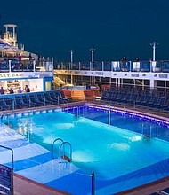 Quantum of the Seas is a huge ship, which usually cruises out of China, boasts a retractable roof over its pool for fun times come rain or shine.  CREDIT: Courtesy Royal Caribbean International