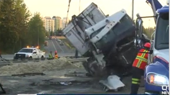 A semi driver rolled his vehicle over on northbound I-5 in Federal Way blocking multiple lanes of traffic Wednesday morning.