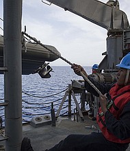 Seaman Jose Palomares, left, from Houston, and Seaman Recruit Austin Batchelor, from Oklahoma City, Oklahoma,