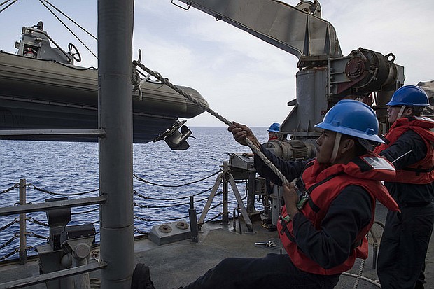 Seaman Jose Palomares, left, from Houston, and Seaman Recruit Austin Batchelor, from Oklahoma City, Oklahoma,