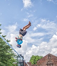 Ben Schneider shows off his skills on the slackline, while top left, Chris Eldredge competes in the Monster Energy freestyle bike best trick final