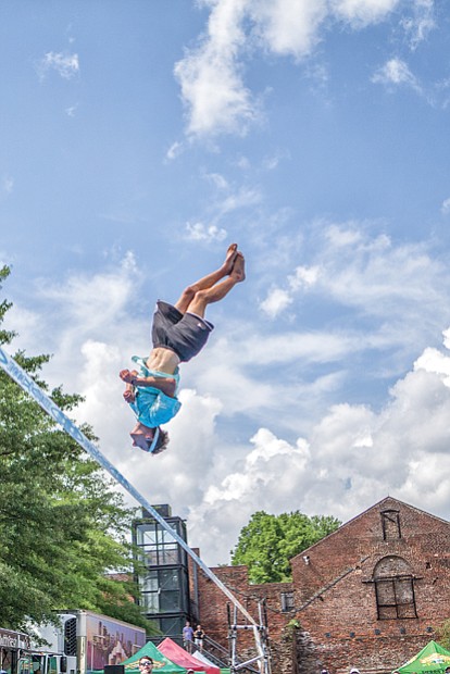 Ben Schneider shows off his skills on the slackline, while top left, Chris Eldredge competes in the Monster Energy freestyle bike best trick final