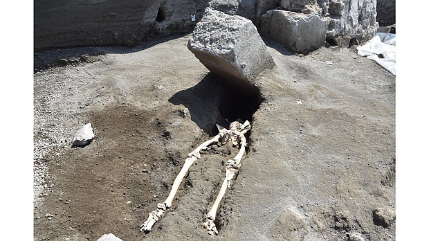 Archaeologists at Pompeii uncovered these remains of a 30-year-old man who appears to have survived the initial eruption of Vesuvius in 79 A.D., only to be killed when he was struck by a large slab of stone.