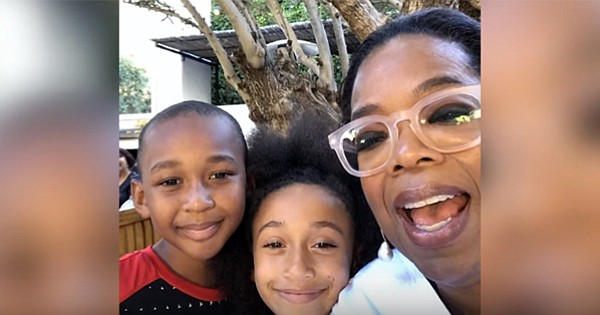 Oprah Winfrey takes a selfie with the CEO and co-CEO of Junior Flips