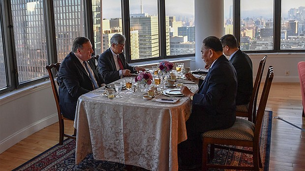 A photo posted to Pompeo's official Twitter account showed the North Koreans dining on a meal of "steak, corn and cheese."