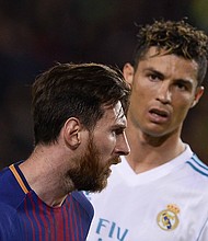 Ronaldo looks at Messi during El Clasico on May 6, 2018.