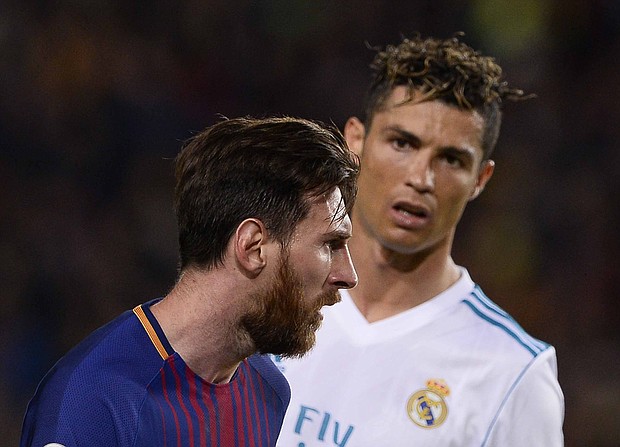 Ronaldo looks at Messi during El Clasico on May 6, 2018.