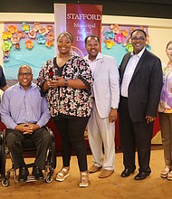 2017-18 Stafford MSD District Teacher of the Year Ashley Bratcher (pictured third from left) was congratulated by, from left, Ray Aguilar of Classic Chevrolet of Sugar Land, Stafford MSD Trustee Auturo Jackson, Bratcher, Texas State Rep. Ron Reynolds, Stafford MSD Superintendent Dr. Robert Bostic and Stafford Elementary Assistant Principal Ileana Duran-Reyes (the 2016-17 Stafford MSD District Teacher of the Year)