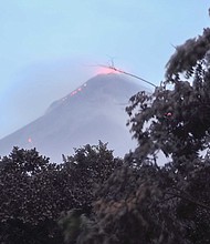 A Monday photo shows ongoing volcanic activity at Fuego.