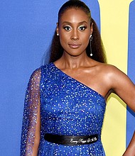 Issa Rae dons a Pyer Moss gown with a belt that includes the song reference "Every N***a Is a Star."