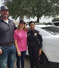 From left: David Mills and wife Wendy pictured with METRO Police Chief Vera Bumpers.