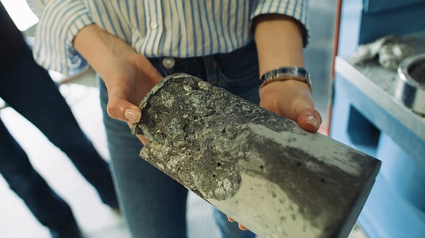 A cylinder of CarbonCure concrete after undergoing a strength test.