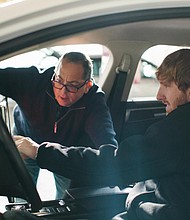 Luminar CEO Austin Russell, right, works with his co-founder Jason Eichenholz.
