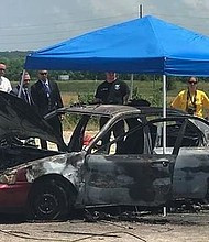  The charred car was located near Troy, Mo. with a body inside in the driver's seat.