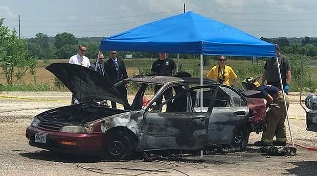  The charred car was located near Troy, Mo. with a body inside in the driver's seat.
