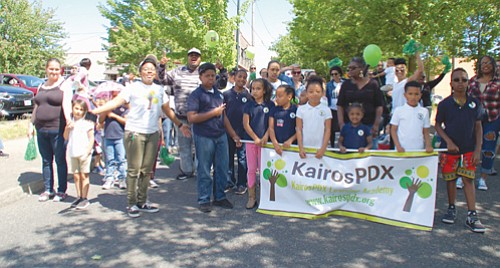 Students, staff, and parents of KairosPDX elementary school march proudly for Saturday’s Juneteenth parade.