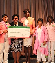 Alpha Kappa Alpha Sorority, Inc. International President Dorothy Buckhanan Wilson and other members presents $10,000 donation to Prairie View A&M University President Dr. Ruth Simmons/photo Senora Webster