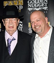 Richard Harrison, best known to viewers of the History Channel reality series "Pawn Stars" as "The Old Man," died Monday morning after a long battle with Parkinson's Disease, according to his son, Rick Harrison. Richard "The Old Man" Harrison (L) and his son Rick Harrison in 2014.