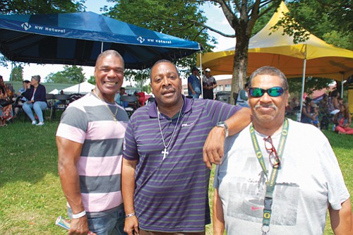 Otha Tyler (from left), Alex Spearman, and Glenn Harper enjoy Good in the Hood festivities at Martin Luther King School Park.