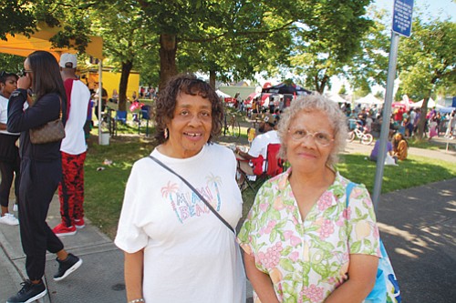 Portlanders Jeanette Carr (left) and Mildred Tarver at the bustling King School Park grounds for the 2018 festival.