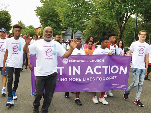 Emmanuel Temple’s congregation shows out for Saturday’s parade.