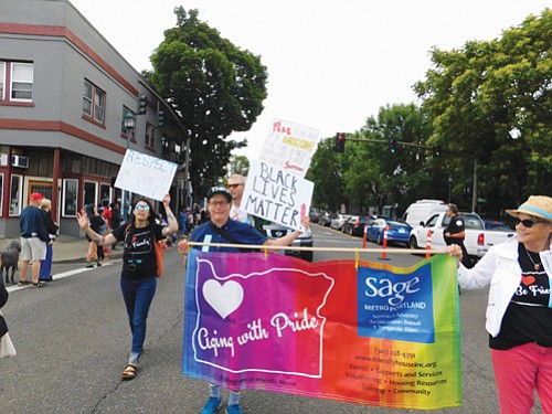 Services and Advocacy for Gay, Lesbian, Bisexual, & Transgender Elders, march with pride for the Good in the Hood parade.