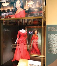 One of Oprah Winfrey’s dresses is displayed in a section of the “Watching Oprah: The Oprah Winfrey Show and American Culture” at the National Museum of African American History and Culture in Washington. 