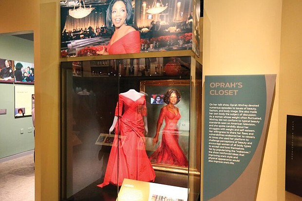 One of Oprah Winfrey’s dresses is displayed in a section of the “Watching Oprah: The Oprah Winfrey Show and American Culture” at the National Museum of African American History and Culture in Washington. 